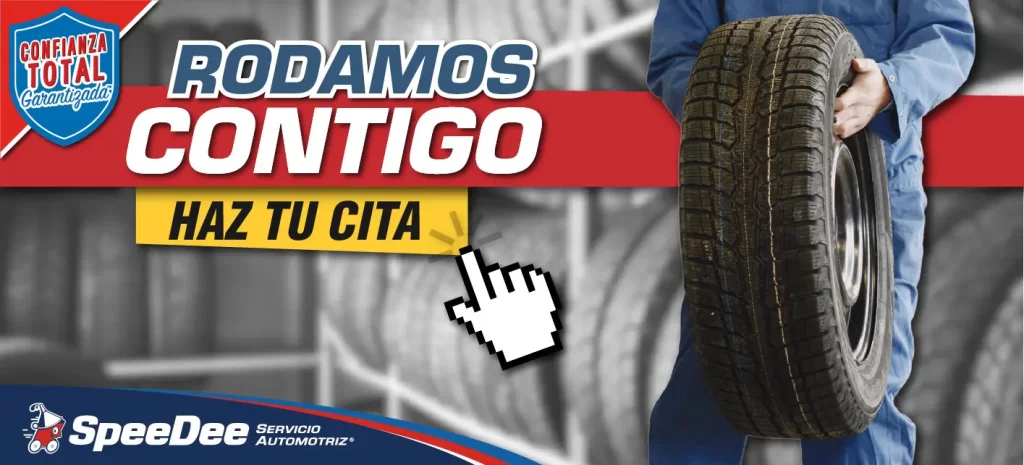 Banner con un mecánico sosteniendo una llanta